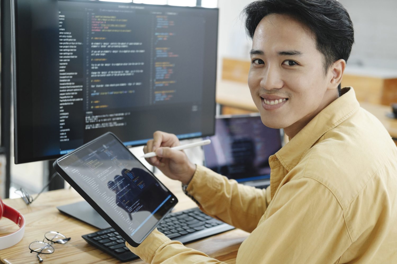 Programming. Programmer Working On Computer In IT Office, Sitting At Desk Writing Codes. Programmer Typing Data Code, Working On Project In Software Development Company.